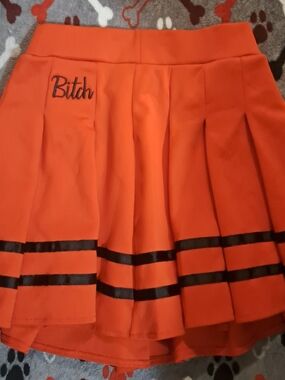 Red Pleated Mini Skirt with Script Detail